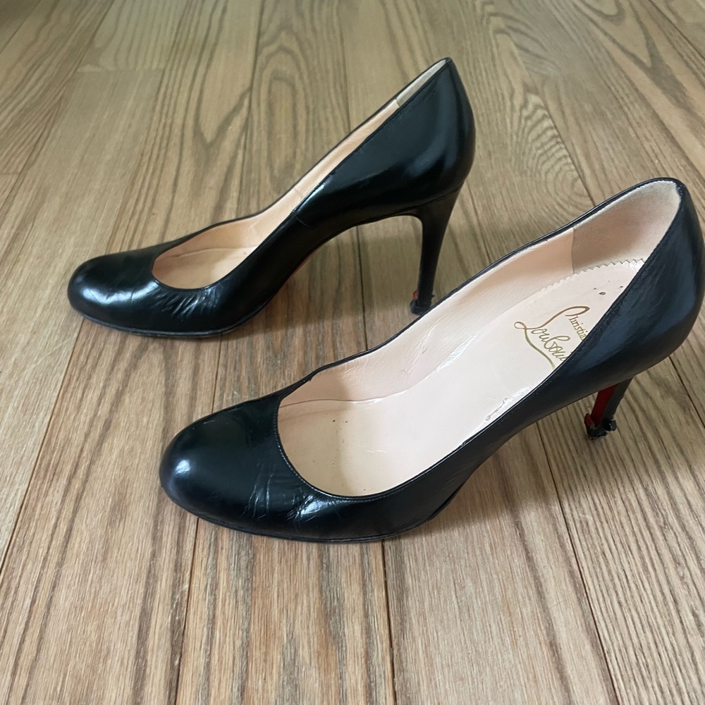 Christian Louboutin very worn round toe pumps